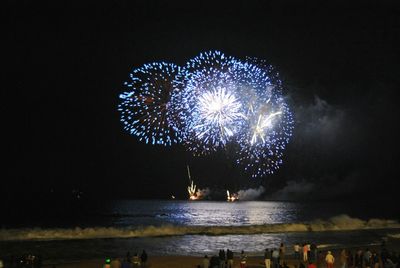 Firework display at night