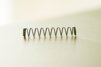 Close-up of coil on table