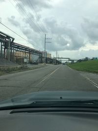 Road seen through car windshield