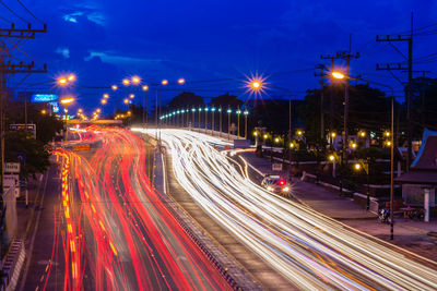 High angle view of light trails on road at night