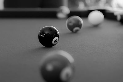 Close-up of pool balls on table