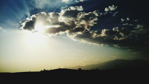 Scenic view of landscape against sky during sunset