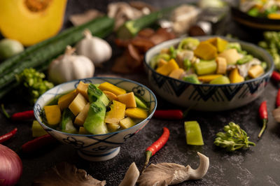 High angle view of fruits in bowl on table