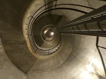 Low angle view of spiral staircase in building