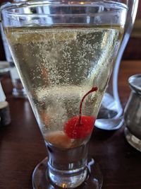 Close-up of coffee in glass on table