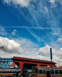 Low angle view of building against cloudy sky