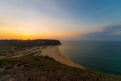 Scenic view of sea against sky during sunset