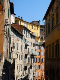 Low angle view of residential buildings against sky