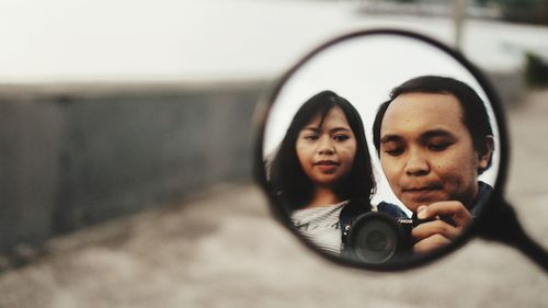 Portrait of man photographing