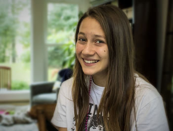 Portrait of smiling girl at home