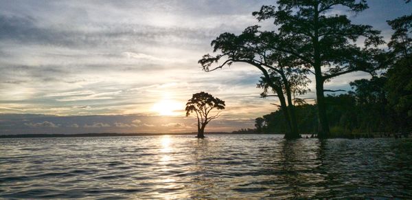 Scenic view of sea against sky during sunset