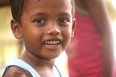 Close-up portrait of smiling boy