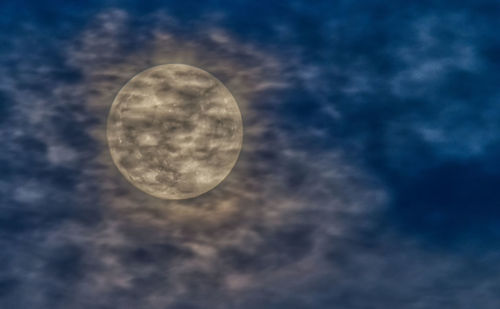 Low angle view of moon against sky