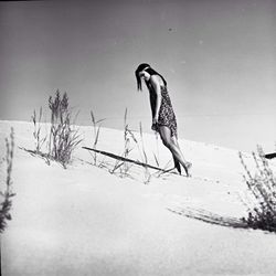 Full length of woman jumping in mid-air