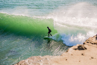 Man surfing in sea