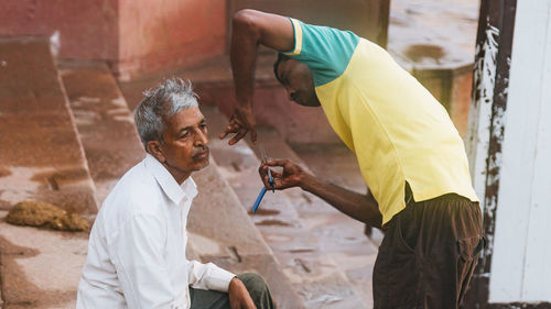 Side view of man working