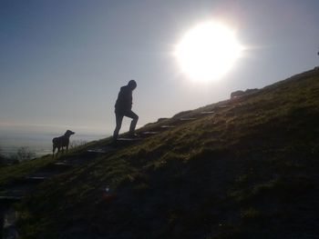 Silhouette of woman in sunlight