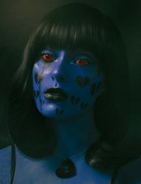 Close-up portrait of a serious young woman