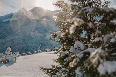 Scenic view of snow covered mountains against sky