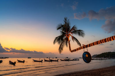 Scenic view of sea against sky at sunset