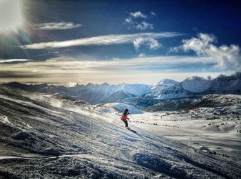 Scenic view of mountains against sky during winter
