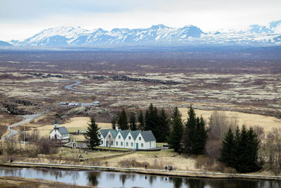 Tourist exploring mountainous landscape in winter