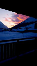 Scenic view of silhouette mountains against sky during sunset