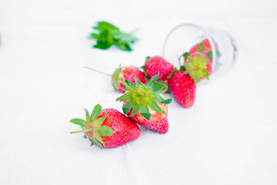 Close-up of strawberries against white background
