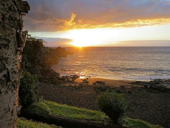 Scenic view of sea at sunset