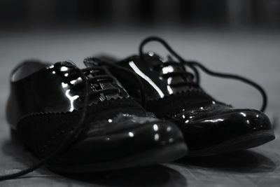 Close-up of shoes on table