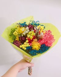 Close-up of woman holding bouquet