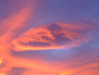 Low angle view of dramatic sky during sunset