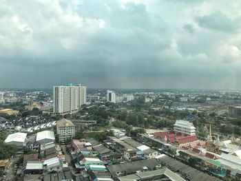 High angle view of buildings in city against sky