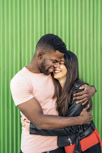 Young couple kissing outdoors