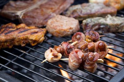 Close-up of meat on barbecue grill