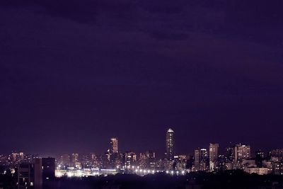 Illuminated cityscape at night