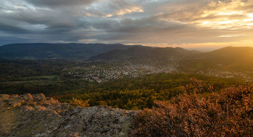 Scenic view of landscape against sky during sunset