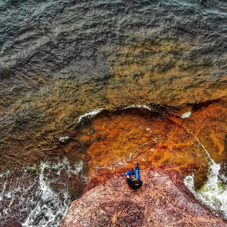 rock, rock - object, rock formation, real people, solid, leisure activity, lifestyles, one person, adventure, day, activity, nature, men, rear view, climbing, exploration, geology, sport, extreme sports, outdoors, formation