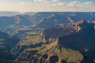 Aerial view of landscape with mountain range in background