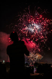 Firework display at night