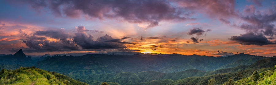 Panoramic view of mountains against dramatic sky