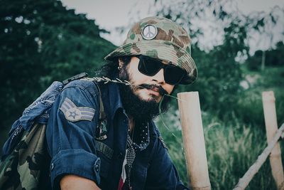 Midsection of man wearing mask