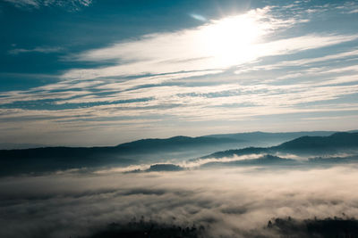 Scenic view of mountains against sky during sunset