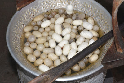 High angle view of eggs in container at market stall