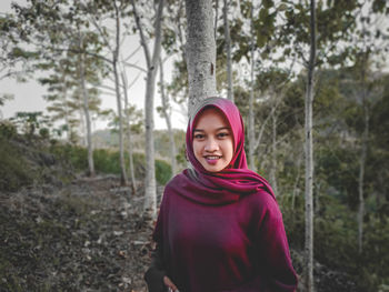 Portrait of a smiling young woman