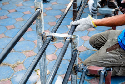 High angle view of man working on bridge