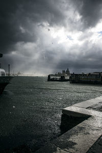 Scenic view of sea against sky during rainy season