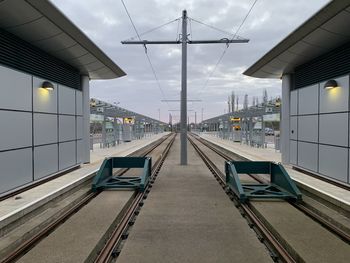 Railroad station platform against sky