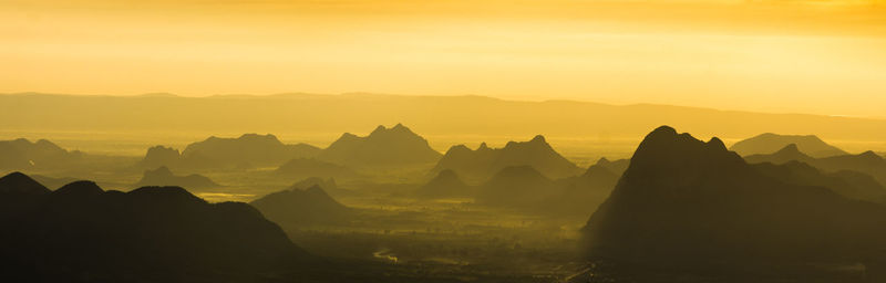 Silhouette of mountain range during sunset