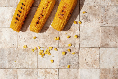 High angle view of bread on tiled floor